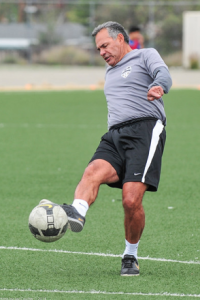 Rene Miramontes demonstrating for players at the March SDDA/Army National Guard soccer clinic. Photo Credit: Jay Coulter/JayCPhotos