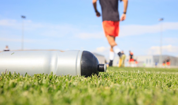 youth soccer news: Water bottle on soccer field