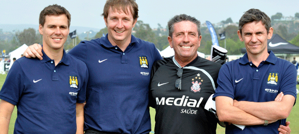 Jeff Illingworth with coaches from Manchester City Football Club's Academy at this year's soccerloco Surf Cup