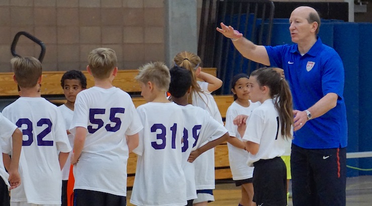 Keith Tozer coaching youth futsal players in San Diego at ID Camp
