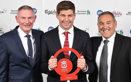 Steven Gerrard of Liverpool poses for a photograph with Dave Shannon and Hughie McAuley.