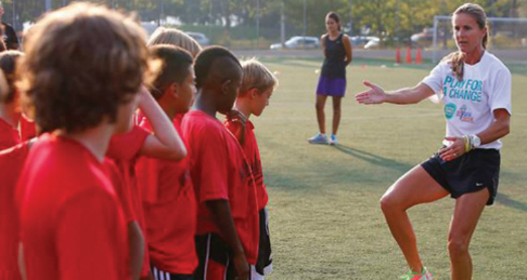 Brandi Chastain at a clinic, communicating and teaching the next generation of players. Photo Courtesy of Eastern New York Youth Soccer Association. 