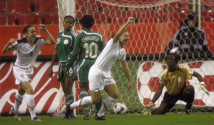 Lori Chalupny scores in 2007 FIFA Women's World Cup. (AP Photo/Julie Jacobson)