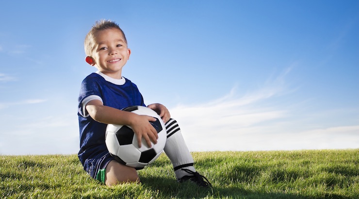 Youth Soccer news for soccer parents - Happy youth soccer player