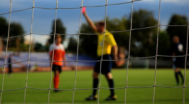 Soccer Referee gives a red card to a youth soccer player - on GoalnNation Soccer News