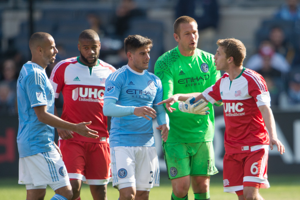 New England Revolution midfielder Scott Caldwell argues with New York City FC goalkeeper Josh Saunders and defender Ethan White after a penalty in the second half. Credit: William Hauser-USA TODAY Sports