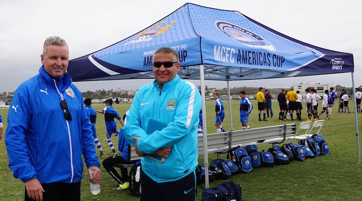 Youth Soccer Tournament News - Albion SC youth soccer coach Paul Holohan with Manchester City FC's Gavin Rhodes at the MCFC Americas Cup 2016
