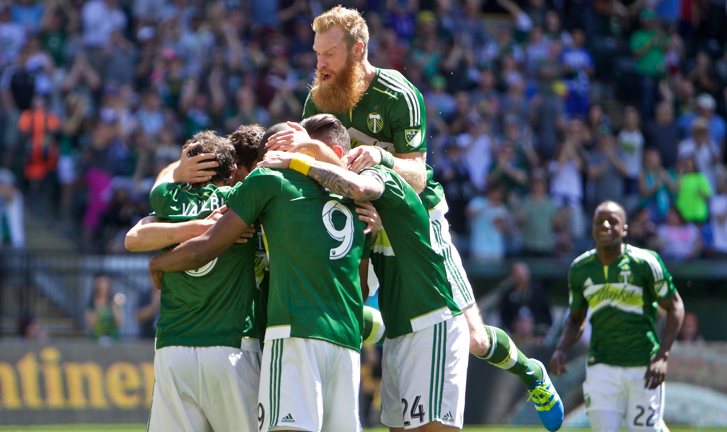 May 1, 2016; Portland, OR, USA; Portland Timbers defender Nat Borchers (7) joins the celebration after forward Fanendo Adi (9) scored a goal at Providence Park. Photo: Craig Mitchelldyer-Portland Timbers