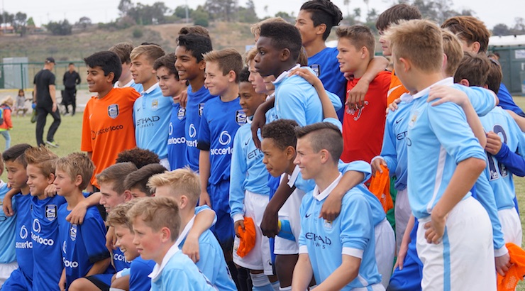 Youth Soccer News - Surf SC and Mancheter City Academy Players at MCFC Americas Cup - Soccer brings people together