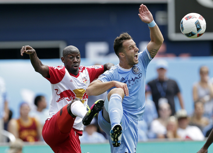 Soccer News - ul 3, 2016; New York, NY, USA; New York Red Bulls forward Bradley Wright-Phillips (99) battles for the ball with New York City FC defender RJ Allen (27) during the first half at Yankee Stadium. Mandatory Credit: Adam Hunger-USA TODAY Sports