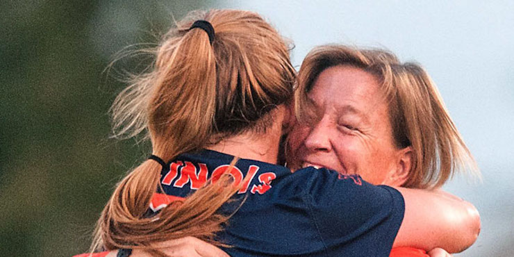 Holly Hart/The News-Gazette Jangle Flaws gets a hug of congratulations from Head Coach Janet Rayfield after becoming the career goals leader. University of Illinois Women's Soccer vs St. Louis, Sunday, August 30, 2015 at the Illinois Soccer Stadium.