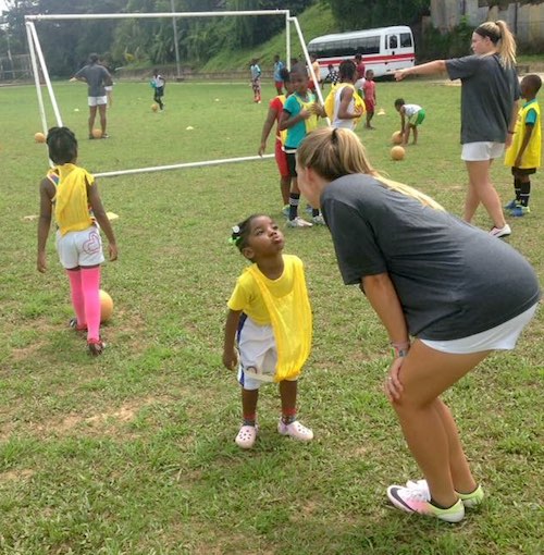Premier International Tours - American Youth Soccer players working with kids in Trinidad