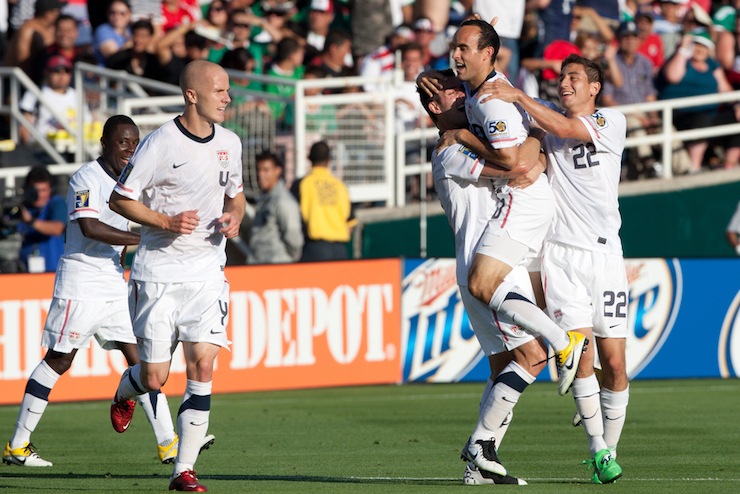 Landon Donovan #10 celebrates with teammates after scoring during the 2011 CONCACAF Gold Cup championship game on May 25, 2011 at a sold out Rose Bowl in Pasadena, CA