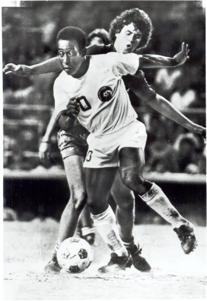 Soccer news - Tom Mulroy on the field with the legendary Pele