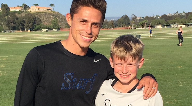 Youth soccer news: Surf SC's Ryan Guy with Grayson Dettoni in Del Mar, California