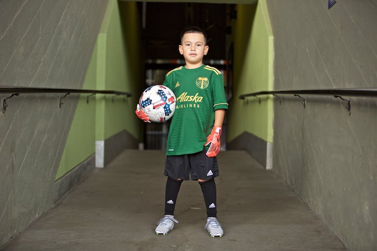 Portland Timbers goalkeeper Derrick Tellez, who signed with the club on Sept. 20 through Make-A-Wish Oregon, stands in the concourse at Providence Park in Portland, Ore.