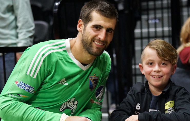 San Diego Sockers' Goalkeeper Chris Toth takes a moment to chat with a youth soccer goalie