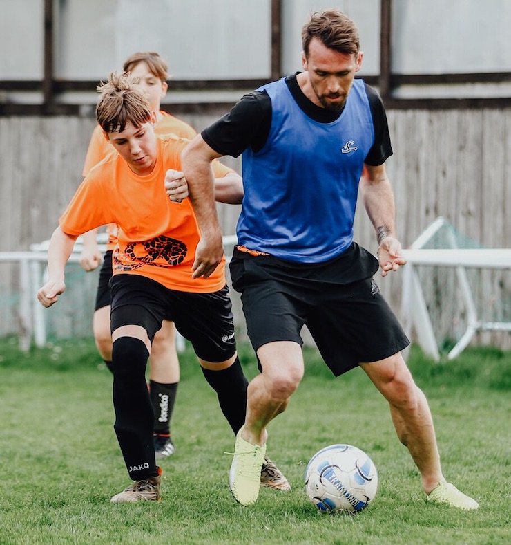 Youth soccer news: Leicester City FC's Christian Fuchs playing with Youth Soccer Players