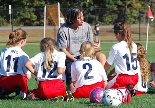 Dr Gina Gentile with soccer players