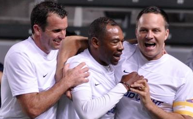 Lassiter is congratulated after scoring @ the Legends Cup