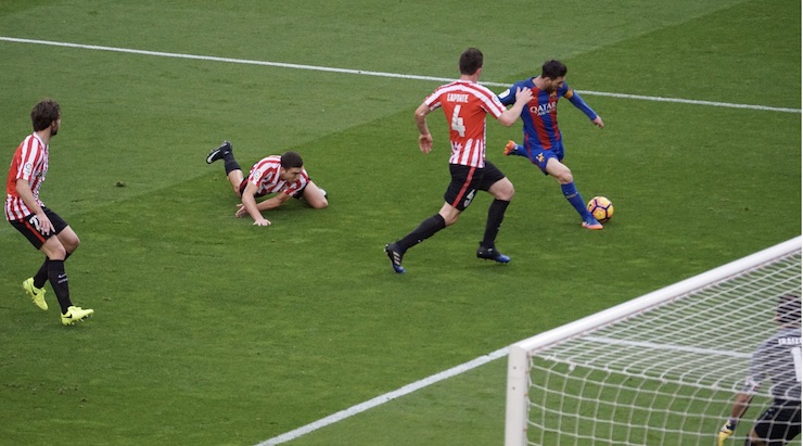 FC Barcelona cruised to a strong win in La Liga, defeating Athletic Bilbao 3-0 at the Camp Nou -- Messi gets past 3 defenders to score a beautiful goal