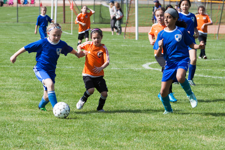 Girls youth soccer team playing a youth soccer match • SoccerToday